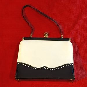 Vintage wing tip handbag